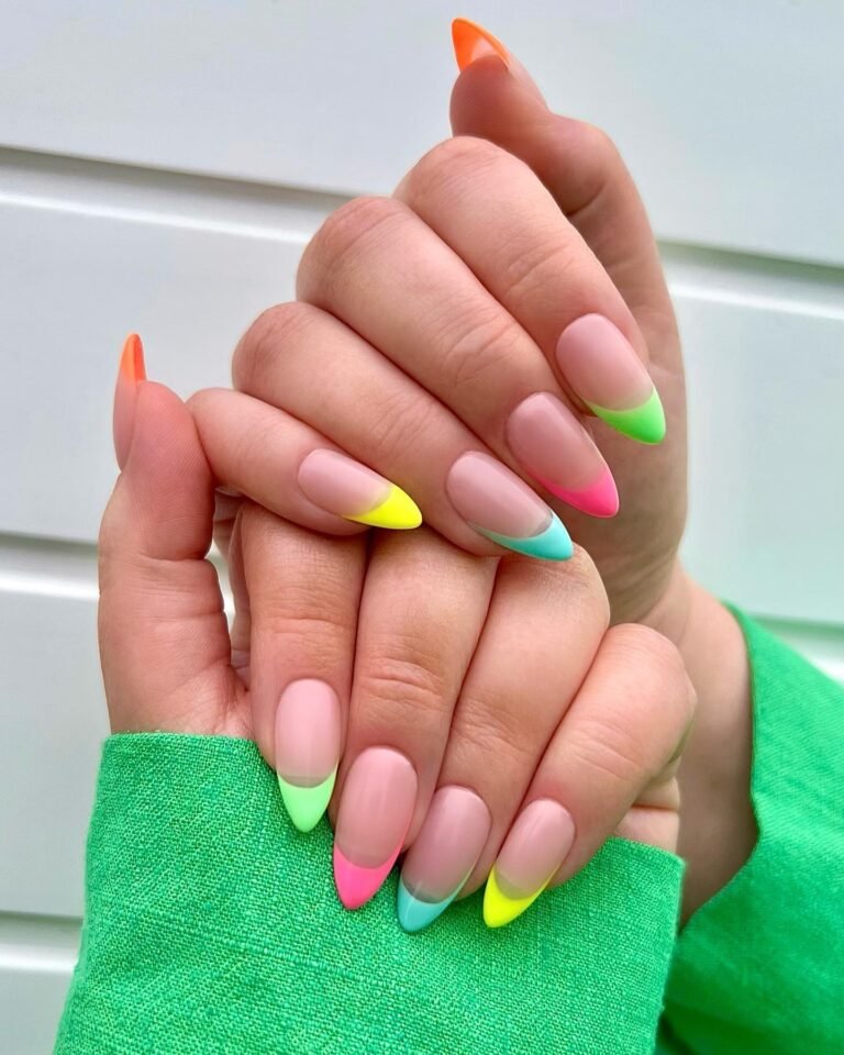 Bright neon French tip manicure with mint, yellow, pink, and lime colors on nude base