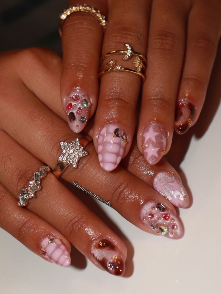 pink glitter y2k nails with stars and rhinestones