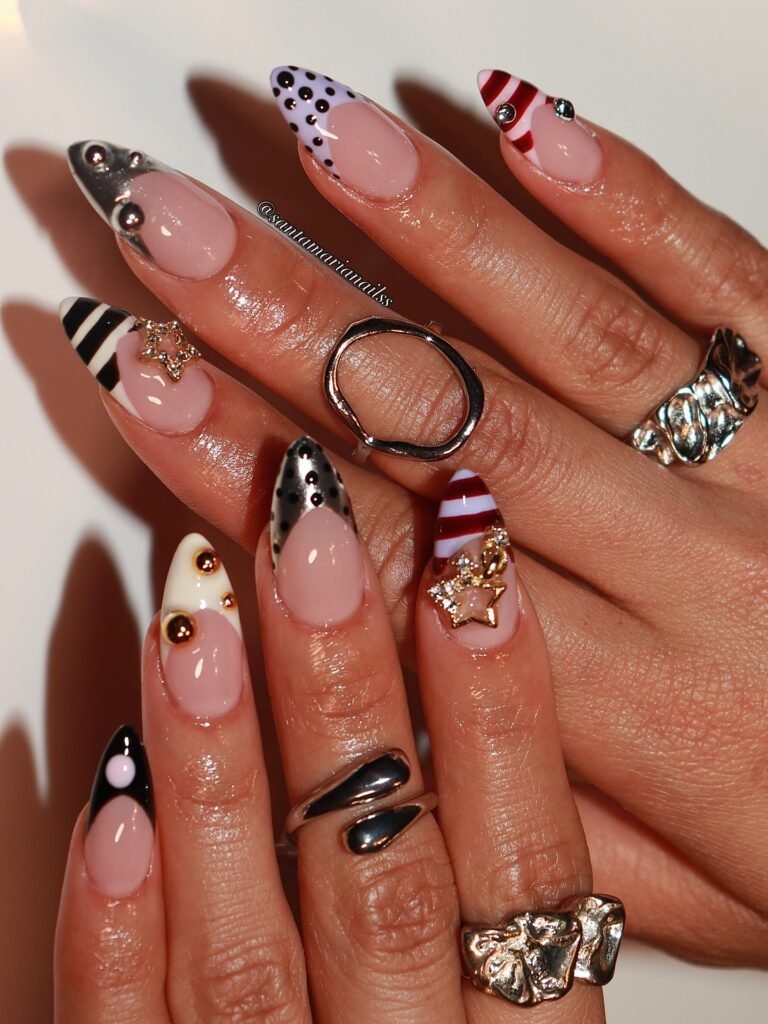 mixed print y2k nails with rhinestones and star charms