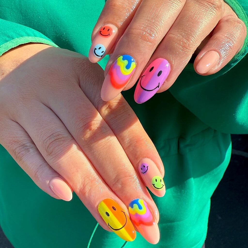 Colorful smiley face rainbow nails with playful summer designs