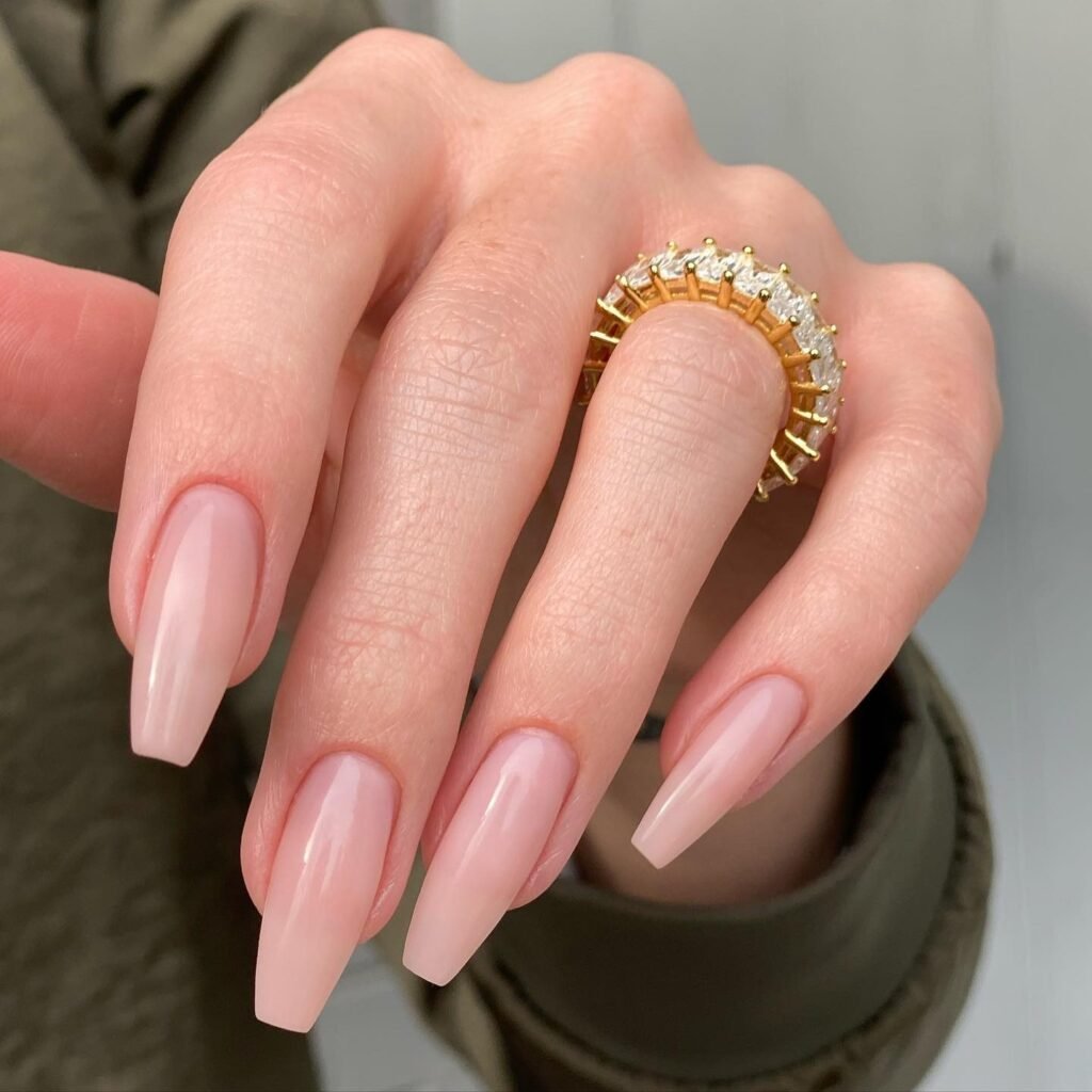 long invisible French coffin nails with soft pink base
