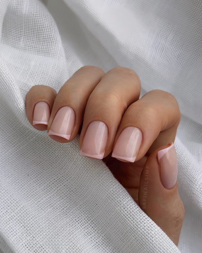 square invisible French nails with soft blush tips