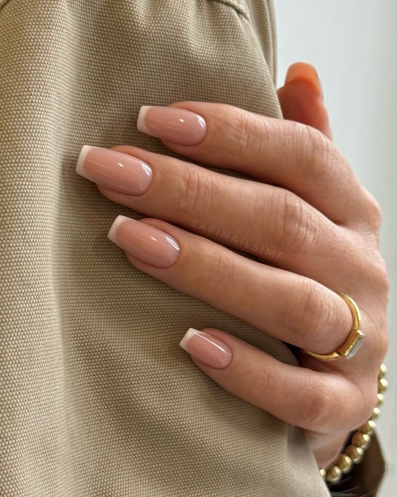 classic invisible French nails with nude pink base