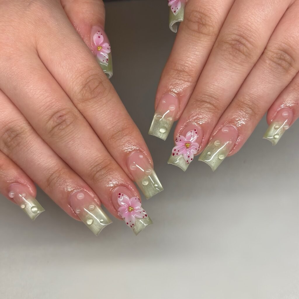 pistachio green jelly nails with pink 3d flowers