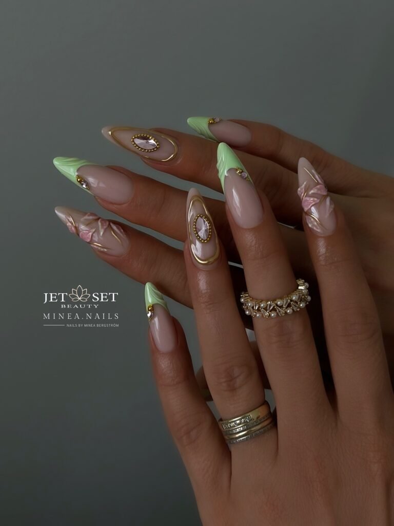 luxury pistachio almond nails with gold gem accents