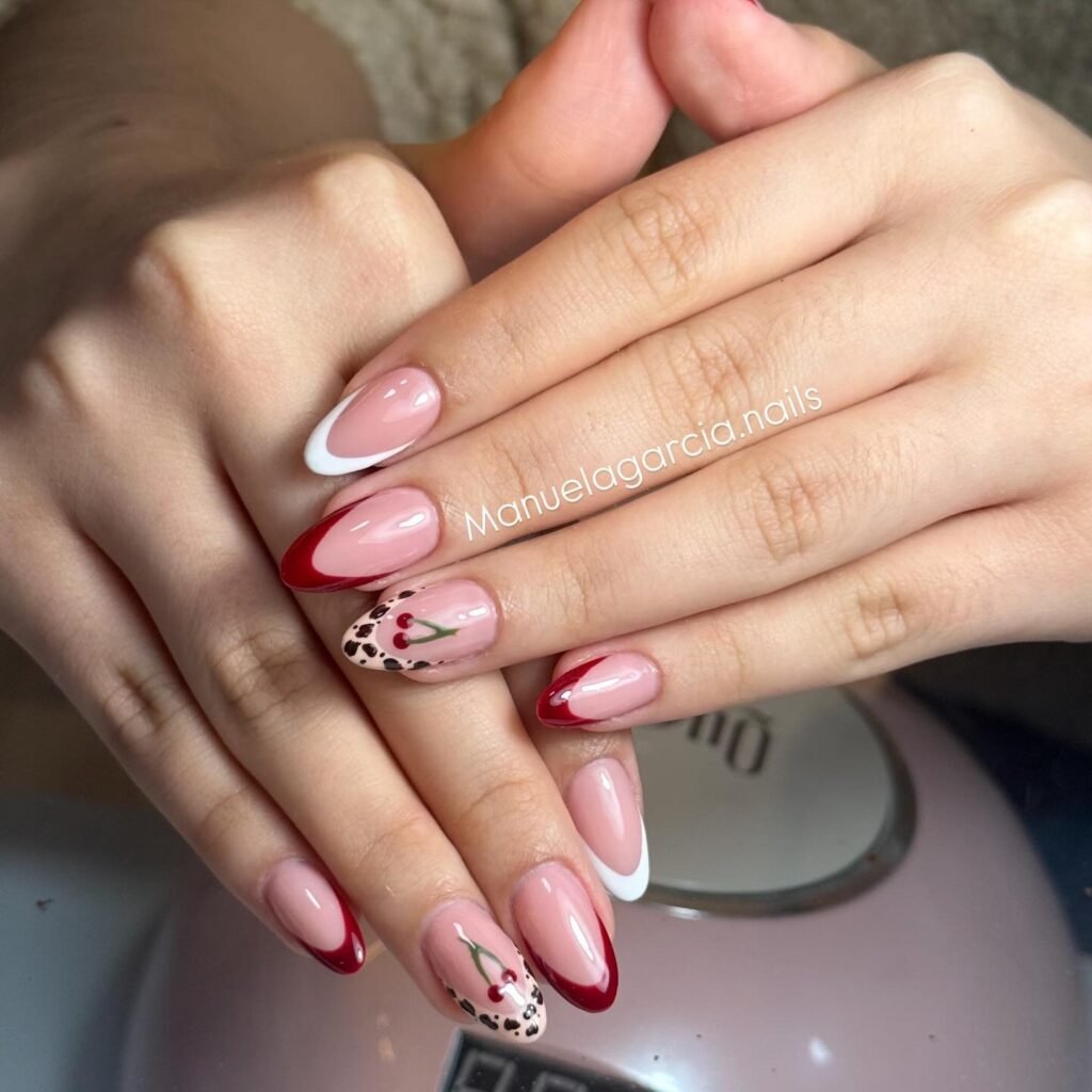 red and white French cherry nails with leopard accent