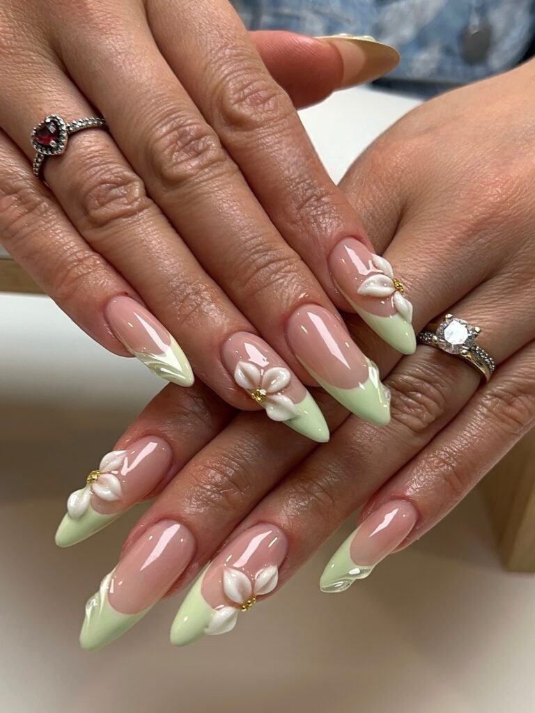 pistachio French nails with white 3d flowers