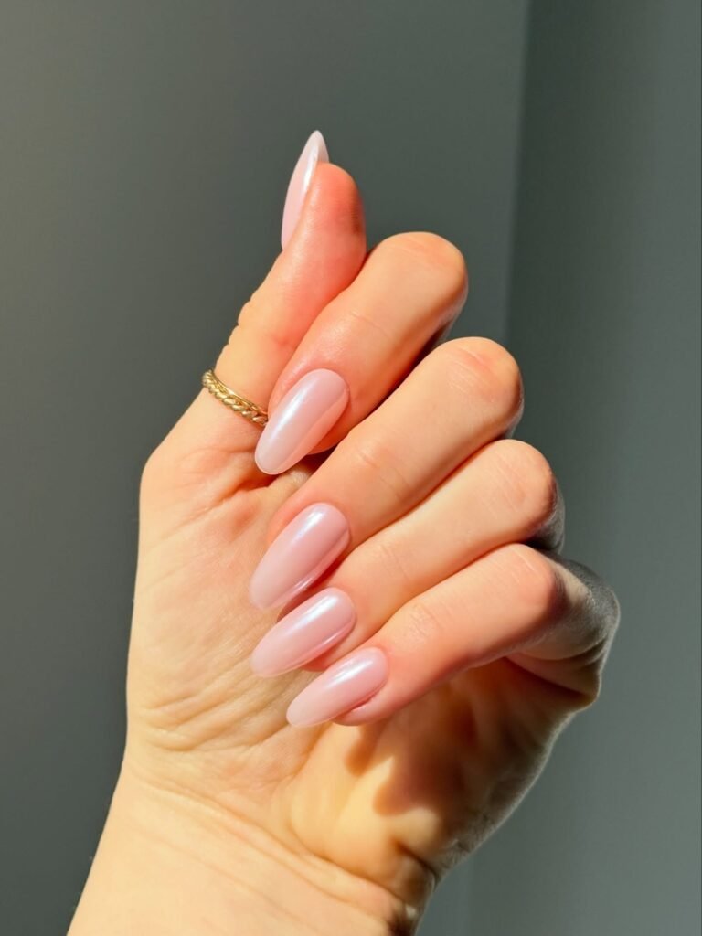 sheer pink glazed June nails on almond shape