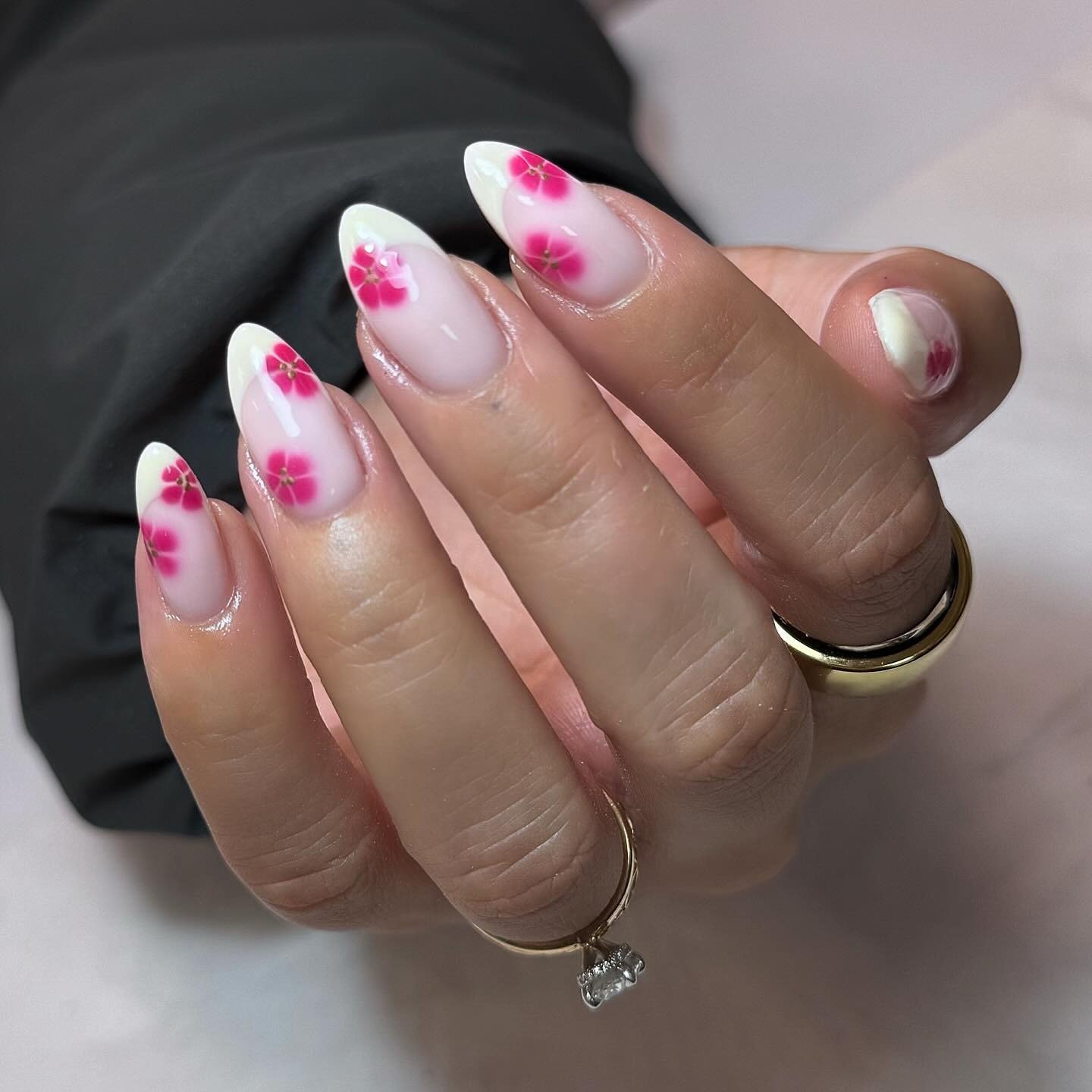 milky June nails with soft pink flower art