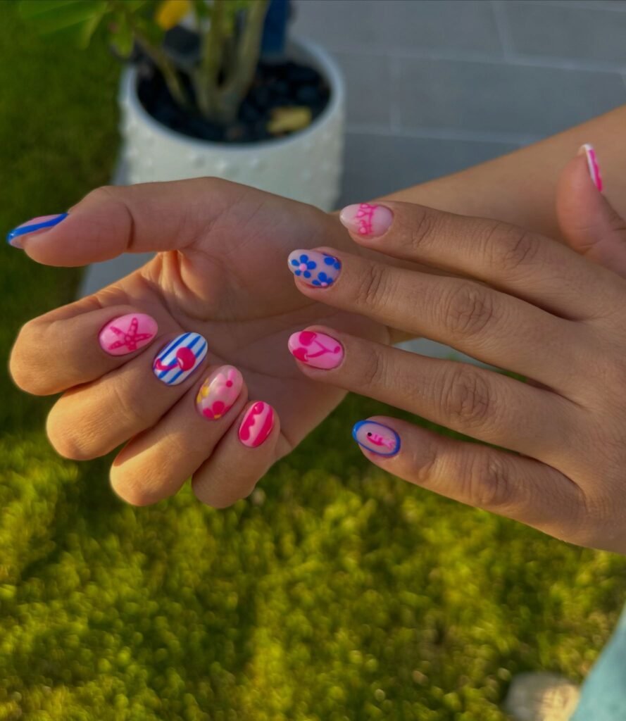 colorful summer cherry nails with flowers and beach designs