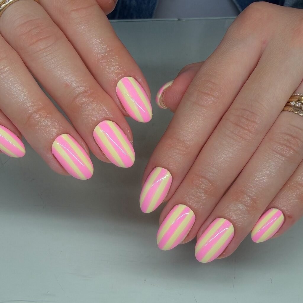 short pink and yellow striped nails for summer