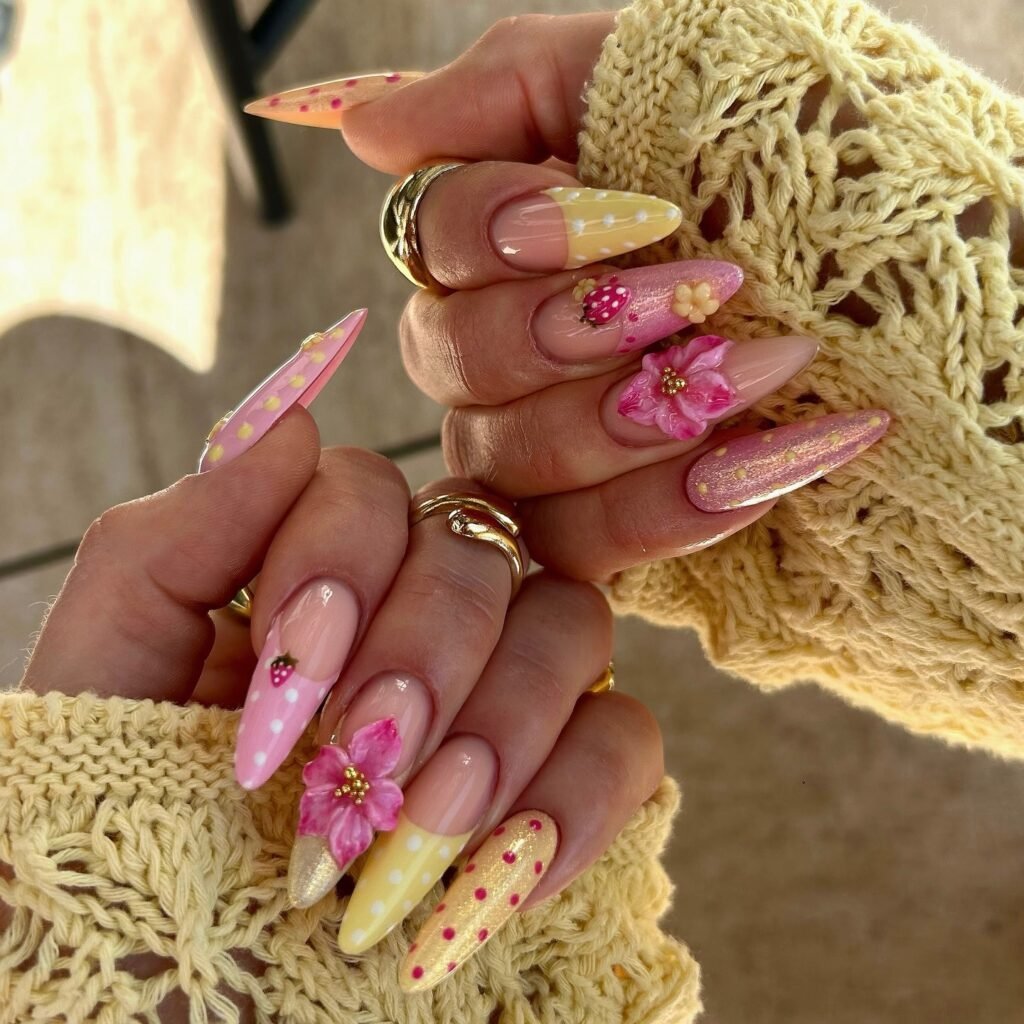 strawberry pink and yellow summer nails with 3D flowers