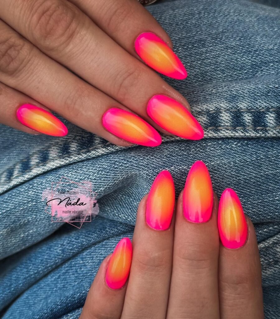Neon pink and orange aura sunset almond nails