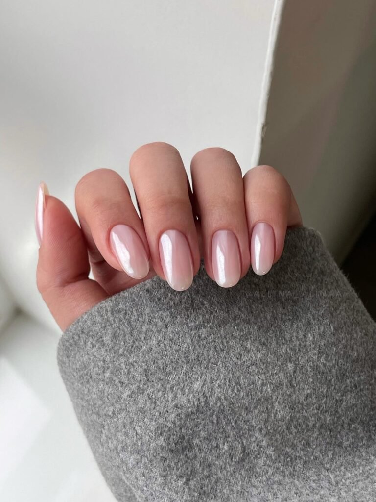 Milky pink oval nails with clean glossy shine