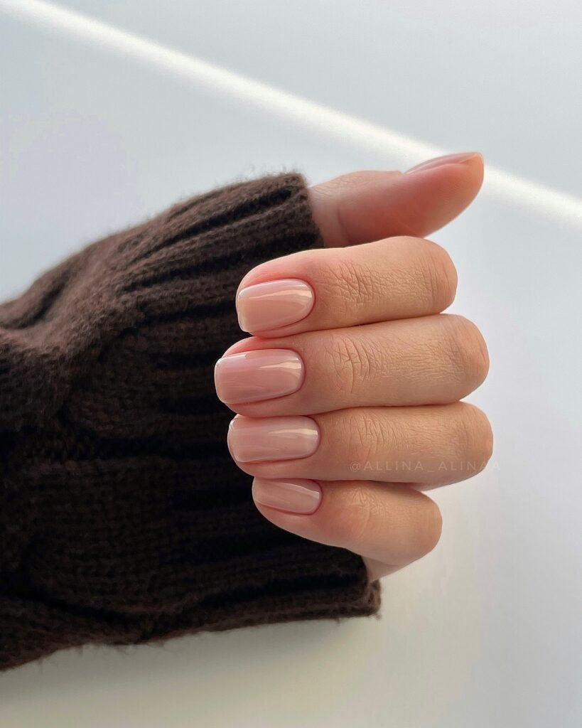 Neutral pink square nails with glossy everyday manicure