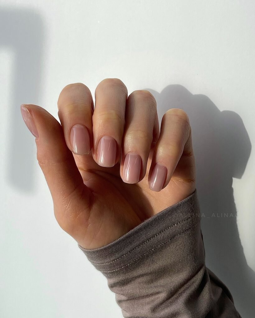 Sheer pink short nails with natural everyday shine