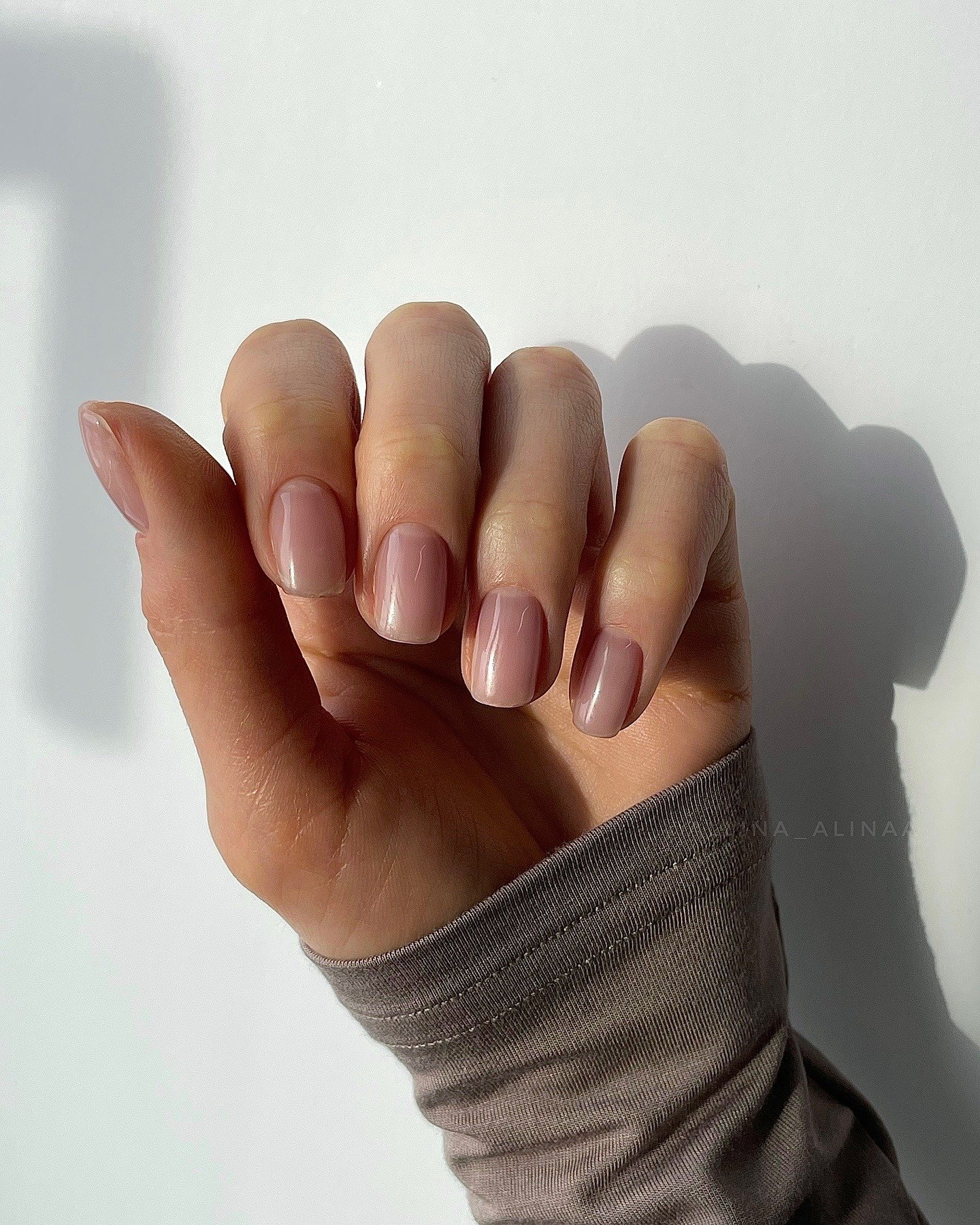 Sheer pink short nails with natural everyday shine