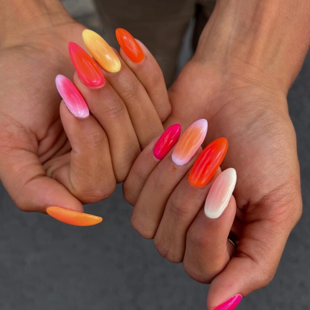 bright summer almond nails with glossy sunset colors