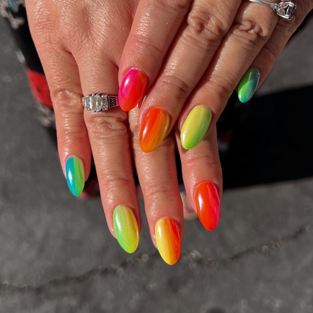 neon aura nails with rainbow gradient summer colors