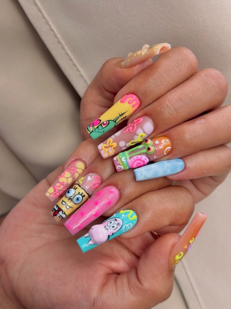 Maximalist rainbow cartoon nails with playful character-inspired details